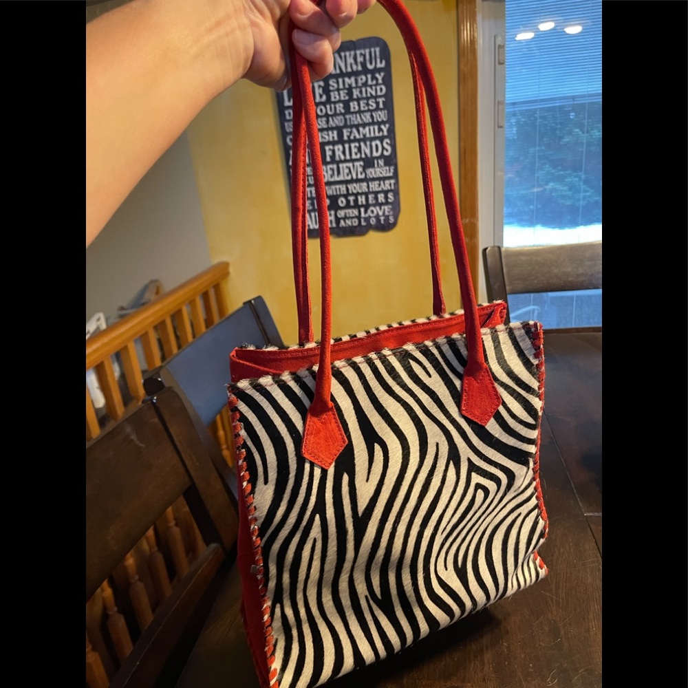 Cecconi Piero- Italian made leather zebra print handbag.